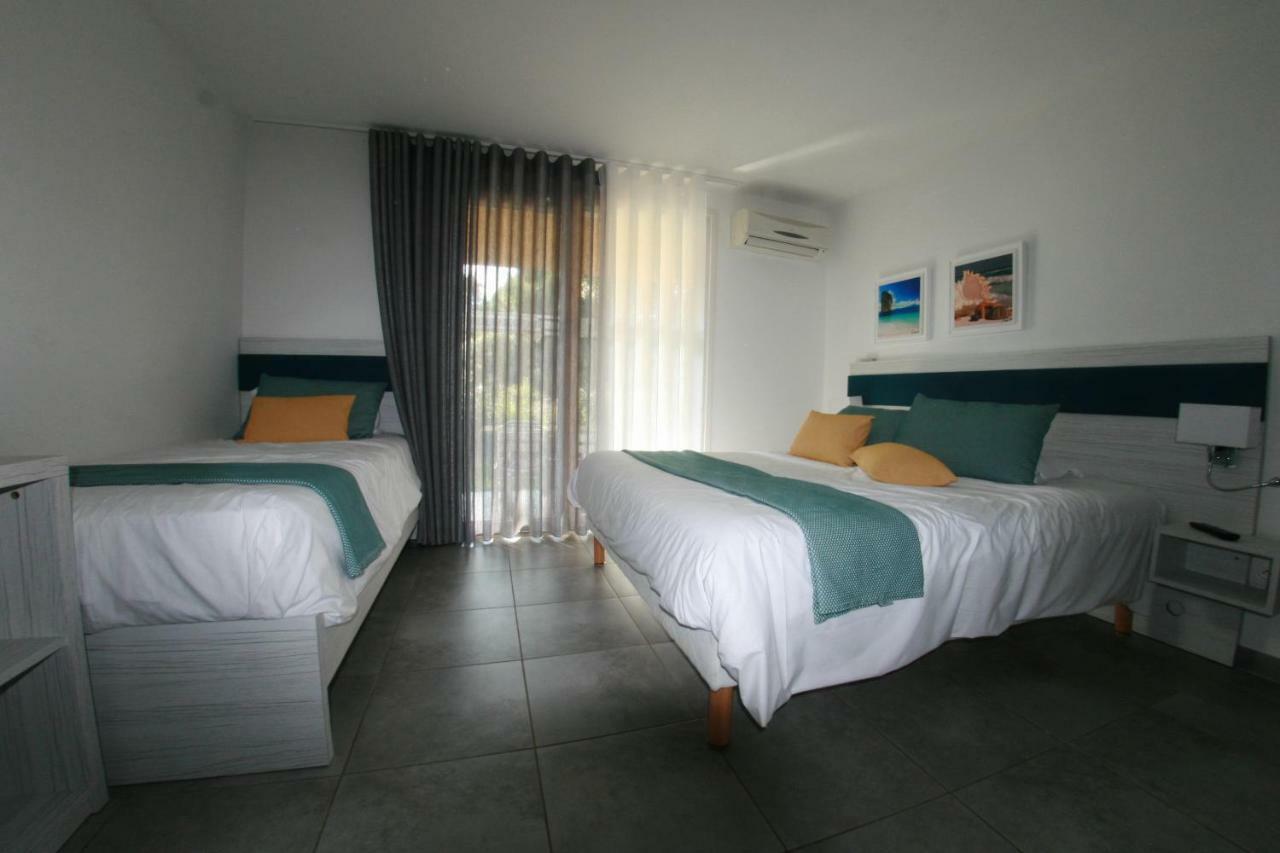 Residence Fiori Di Cala Rossa Lecci Kültér fotó