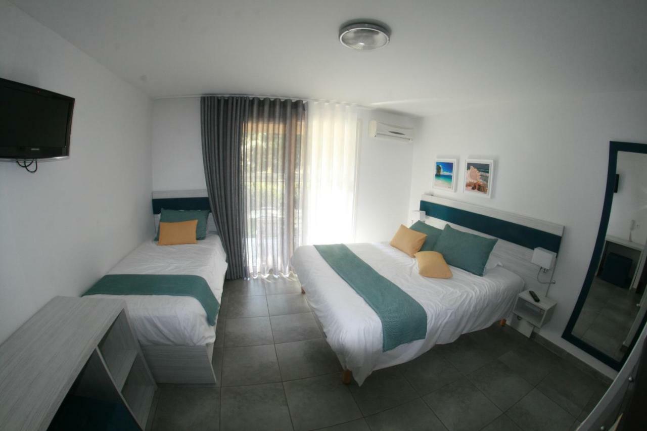 Residence Fiori Di Cala Rossa Lecci Kültér fotó